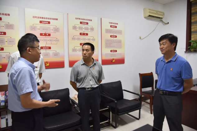 區(qū)委編辦黨支部到集團開展主題黨日活動56